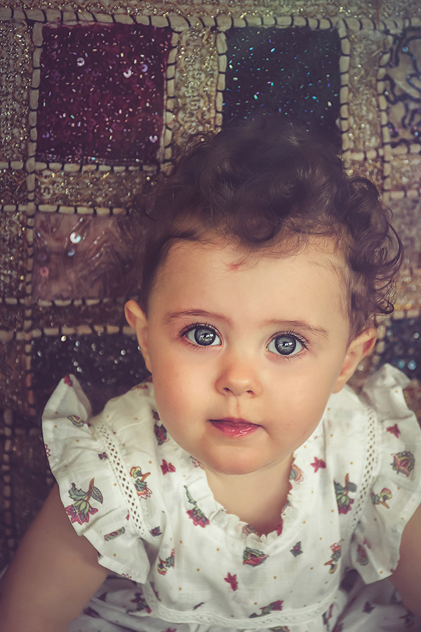 little girl with big blue eyes